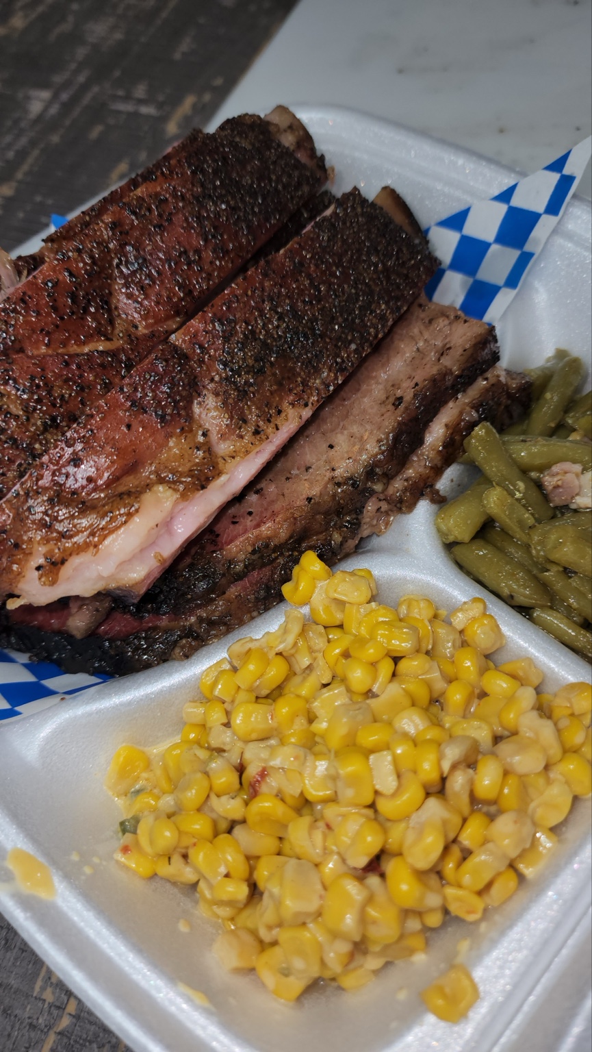 Kingdom Smokehouse barbecue plate with brisket and sides